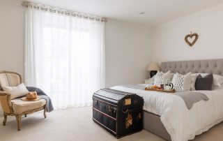 Crisp white Egyptian bed linen & fluffy white towels one of our four light and airy bedrooms